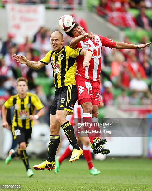 Jonatan Germano of the Heart competes with Stijn Huysegems of the Phoenix during the round 23 A-League match between Melbourne Heart and the...