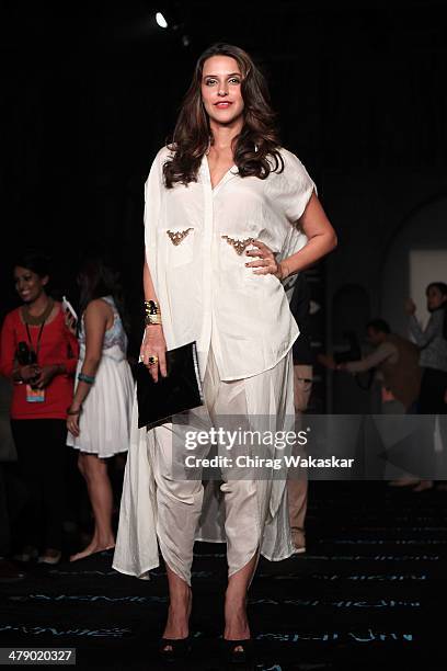 Neha Dhupia poses for pictures at day 5 of Lakme Fashion Week Summer/Resort 2014 at the Grand Hyatt on March 15, 2014 in Mumbai, India.