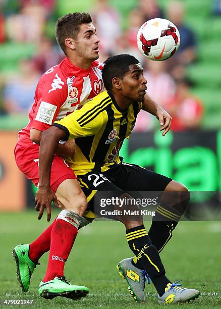 Ben Garuccio of the Heart competes with Roy Krishna of the Phoenix during the round 23 A-League match between Melbourne Heart and the Wellington...