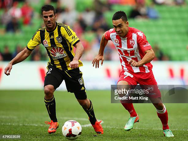 Iain Ramsay of the Heart competes with Manny Muscat of the Phoenix during the round 23 A-League match between Melbourne Heart and the Wellington...