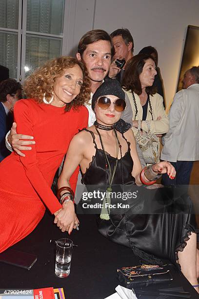 Marisa Berenson, Elie Top and Catherine Baba attend the Marisa Schiaparelli Berenson book signing at Christies on June 29, in Paris France.