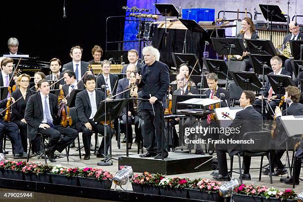 Berliner Philharmoniker with chief conductor Sir Simon Rattle perform live during a concert at the Waldbuehne on June 28, 2015 in Berlin, Germany.