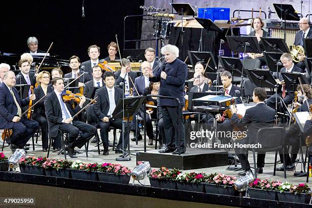 Berliner Philharmoniker with chief conductor Sir Simon Rattle perform live during a concert at the Waldbuehne on June 28, 2015 in Berlin, Germany.