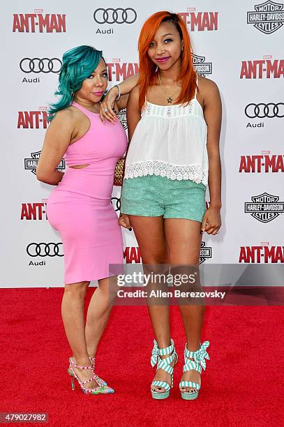 Tameka "Tiny" Cottle-Harris and Zonnique Pullins arrive at the Los Angeles Premiere of Marvel Studios "Ant-Man" at Dolby Theatre on June 29, 2015 in...