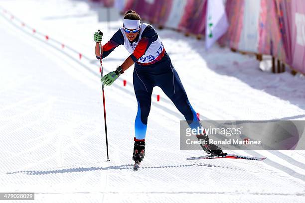 Gold medalist Anna Milenina of Russia drives for the finish line in the Womens Cross Country 5km Free  Standing on day nine of the Sochi 2014...