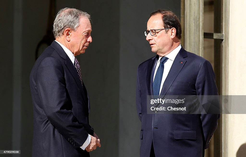 French President Francois Hollande Receives Michael Bloomberg At Elysee Palace