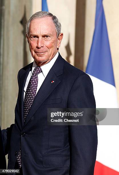 Former New York city Mayor Michael Bloomberg arrives at the Elysee palace prior to a meeting with French President, Francois Hollande on June 30,...