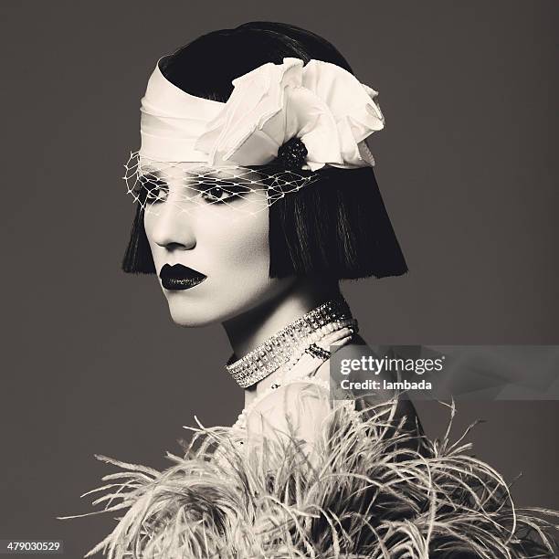 glamorous retro diva - art deco woman stock pictures, royalty-free photos & images