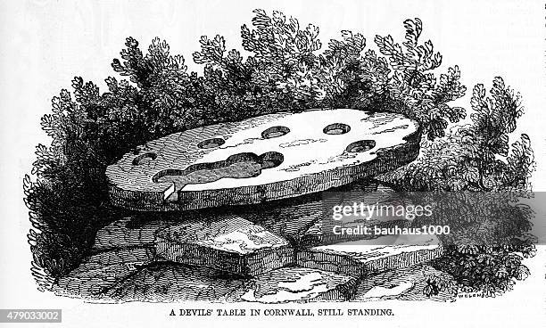 the devils table a druid shrine in cornwall england engraving - pile of rocks white background stock illustrations