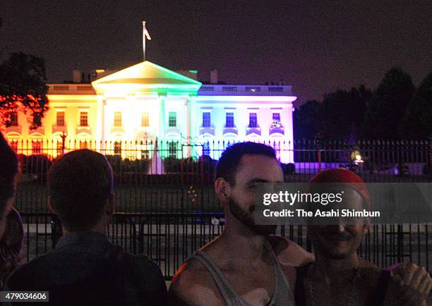 Rainbow-colored lights shine on the White House to celebrate today's US Supreme Court ruling in favor of same-sex marriage June 26, 2015 in...