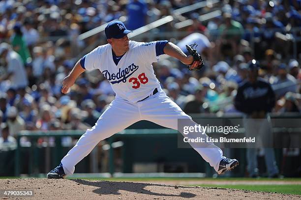 Sam Demel of the Los Angeles Dodgers pitches against the San Diego Padres at Camelback Ranch on March 15, 2014 in Glendale, Arizona.