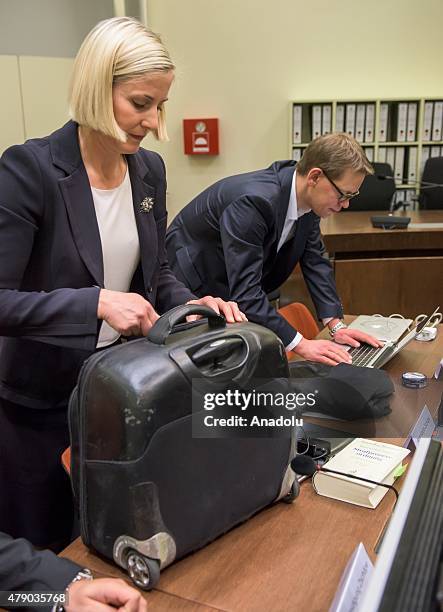 The lawyers of Co-defendant Beate Zschaepe, Wolfgang Heer and Anja Sturm , get prepared for another day of the NSU neo-Nazi murders trial on June 30,...