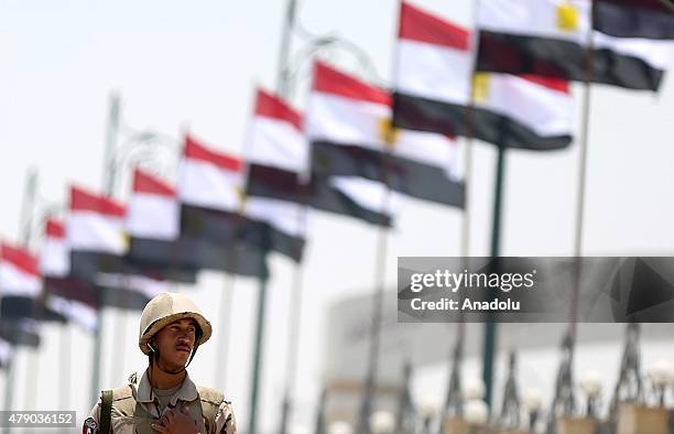 An Egyptian soldier stand guard outside the Tantawi Mosque during the funeral of Egyptian Prosecutor-General Hisham Barakat in Cairo, Egypt on June...