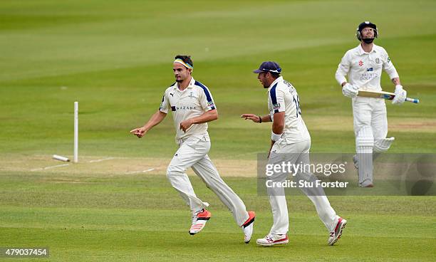 Yorkshire bowler Jack Brooks celebrates with Tim Bresnan after bowling Jamie Harrison during day three of the LV County Championship Division One...