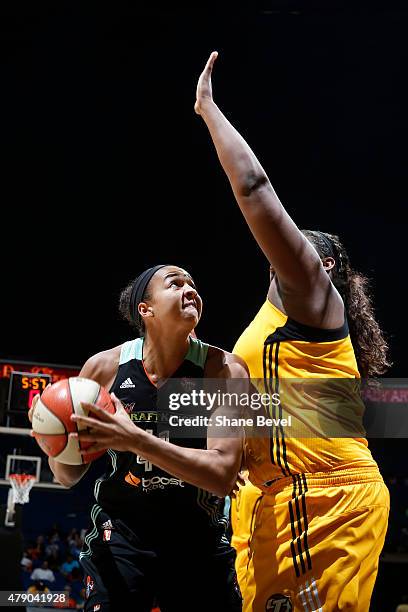 Kiah Stokes of the New York Liberty handles the ball against the Tulsa Shock on June 26, 2015 at the BOK Center in Tulsa, Oklahoma. NOTE TO USER:...