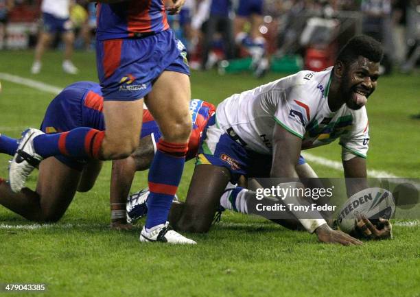 Edrick Lee of the Raiders scores a try during the round two NRL match between the Newcastle Knights and the Canberra Raiders at Hunter Stadium on...