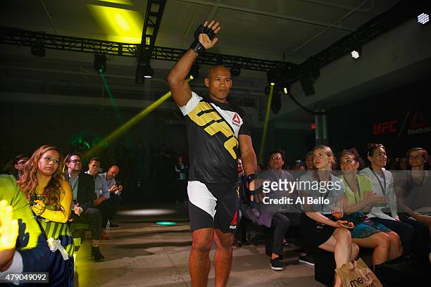 Fighter Jacare Souza displays the new Reebok clothing line during the Reebok Fight Kit Launch at Skylight Modern on June 30, 2015 in New York City.