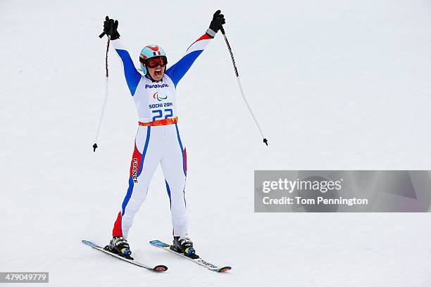 Solene Jambaque of France celebrates in the Women's Giant Slalom Standing during day nine of the Sochi 2014 Paralympic Winter Games at Rosa Khutor...