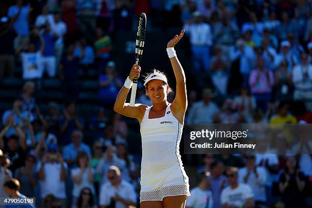 Jana Cepelova of Slovakia celebrates winning her Ladies Singles first round match against Simona Halep of Romania during day two of the Wimbledon...