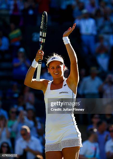 Jana Cepelova of Slovakia celebrates winning her Ladies Singles first round match against Simona Halep of Romania during day two of the Wimbledon...