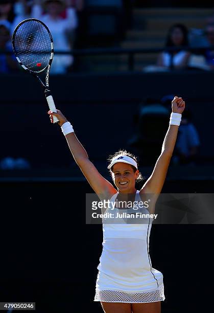 Jana Cepelova of Slovakia celebrates winning her Ladies Singles first round match against Simona Halep of Romania during day two of the Wimbledon...