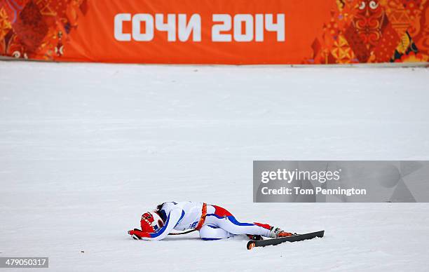 Marie Bochet of France celebrates winning the gold medal in the Women's Giant Slalom Standing during day nine of the Sochi 2014 Paralympic Winter...