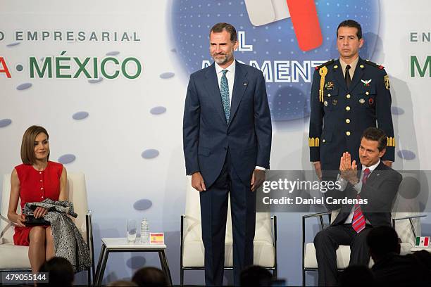 King Felipe VI of Spain and President of Mexico Enrique Peña Nieto during the Business Forum at Presidente Hotel on June 30, 2015 in Mexico City,...