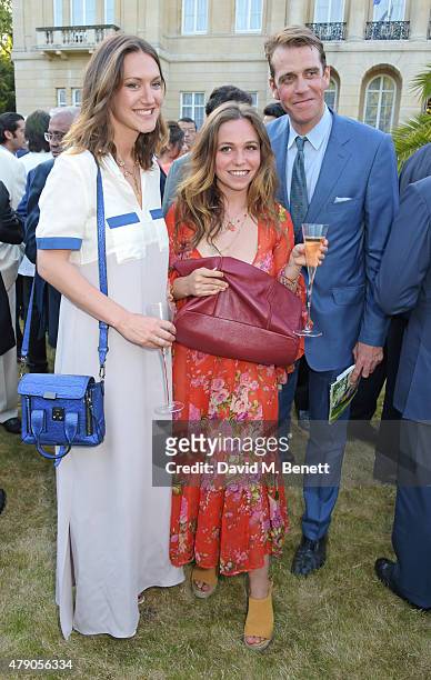Mary Clare Elliot, Ayesha Shand and Ben Elliot attend the Quintessentially Foundation and Elephant Family's Royal Rickshaw Auction presented by...