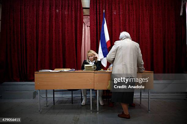 Crimeans go to polls to decide whether the Autonomous Republic of Crimea will join Russia, March 16, 2014. The voting for the referendum on the...