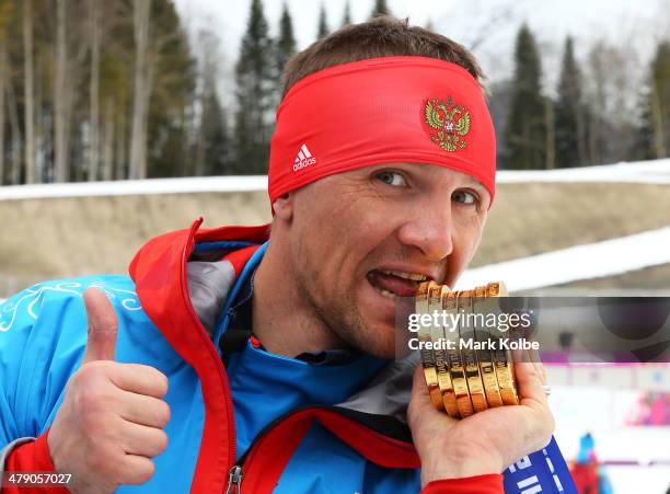 Roman Petushkov of Russia poses with the six gold medals won during the Sochi 2014 Paralympic Winter Games at Laura Cross-country Ski and Biathlon...