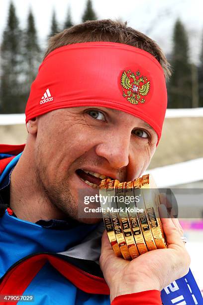 Roman Petushkov of Russia poses with the six gold medals won during the Sochi 2014 Paralympic Winter Games at Laura Cross-country Ski and Biathlon...