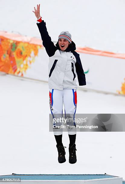 Marie Bochet of France celebrates winning the gold medal during the medal ceremony for the Women's Giant Slalom Standing during day nine of the Sochi...