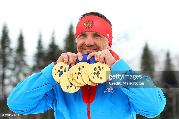 Roman Petushkov of Russia poses with the six gold medals won during the Sochi 2014 Paralympic Winter Games at Laura Cross-country Ski and Biathlon...