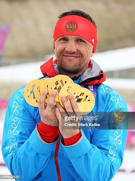 Roman Petushkov of Russia poses with the six gold medals won during the Sochi 2014 Paralympic Winter Games at Laura Cross-country Ski and Biathlon...