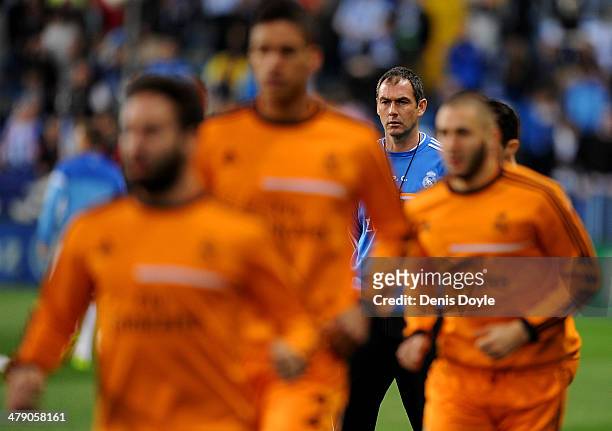 Assistant coach Paul Clement of Real Madrid FC warms-up his players before the La Liga match between Malaga and Real Madrid at La Rosaleda Stadium on...