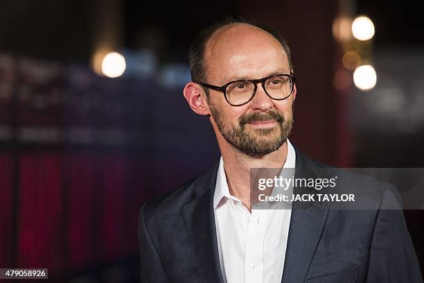 British producer James Gay-Rees poses on the red carpet at the premiere of the film Amy in central London on June 30, 2015. The documentary, which...