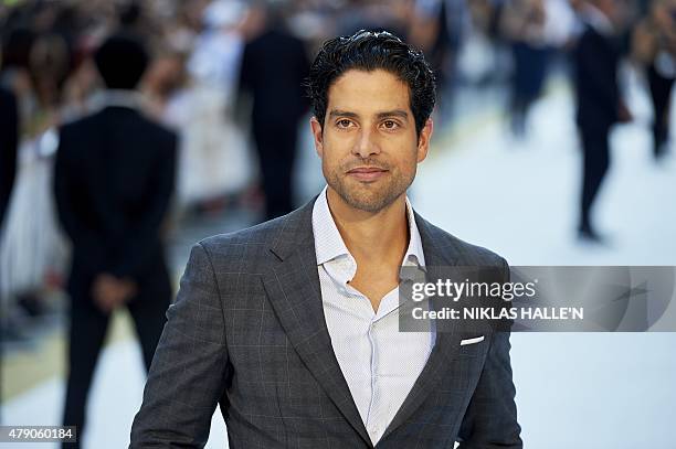 Actor Adam Rodriguez poses on arrival for the European premiere of Magic Mike XXL in central London on June 30, 2015. AFP PHOTO / NIKLAS HALLE'N