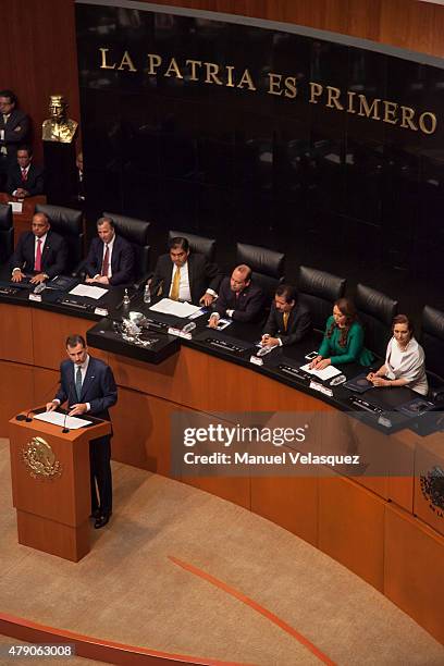 King Felipe VI of Spain gives a speech aimed to the members of Mexican Senate at Senate on June 30, 2015 in Mexico City, Mexico. The Spanish Monarchs...