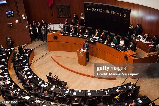 King Felipe VI of Spain gives a speech aimed to the members of Mexican Senate at Senate on June 30, 2015 in Mexico City, Mexico. The Spanish Monarchs...