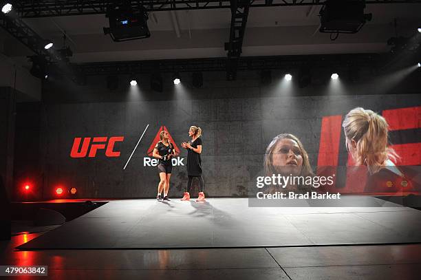 Ronda Rousey and Reebok design expert Corinna Werkle speak at the Launch Of The Reebok UFC Fight Kit at Skylight Modern on June 30, 2015 in New York...