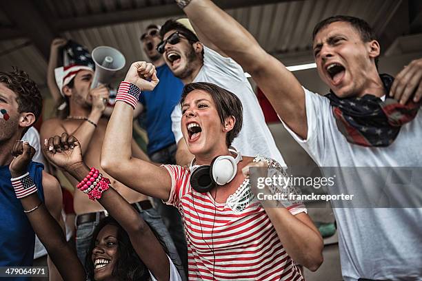 group of american supporters at stadium - crowd shouting stock pictures, royalty-free photos & images