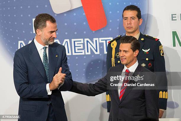 King Felipe VI of Spain and President of Mexico Enrique Peña Nieto attend the Business Forum at Presidente Hotel on June 30, 2015 in Mexico City,...