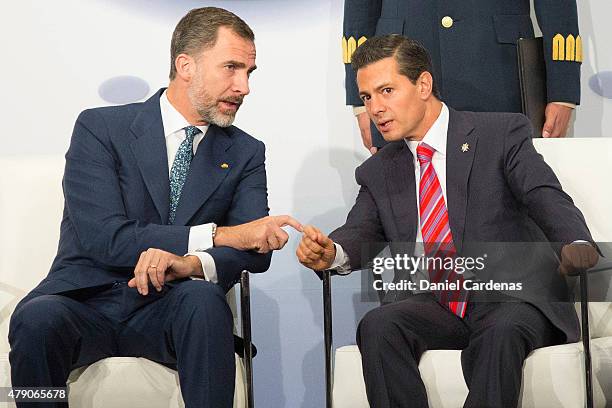 King Felipe VI of Spain and President of Mexico Enrique Peña Nieto talk during the Business Forum at Presidente Hotel on June 30, 2015 in Mexico...