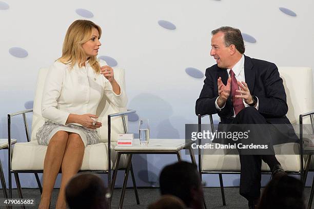 First Lady of Mexico Angelica Rivera and the Minister of Foreign Affairs Jose Antonio Meade talk during the Business Forum at Presidente Hotel on...