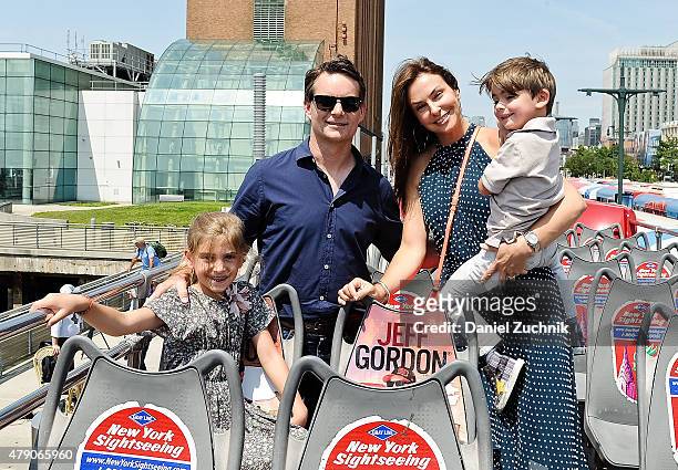 Race Car Driver Jeff Gordon with wife Ingrid Vandebosch and children Ella and Leo pose during Jeff Gordon Honored By Ride Of Fame at Pier 78 on June...
