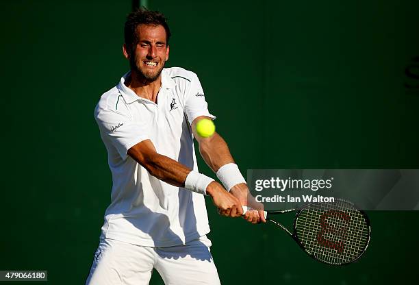 Luca Vanni of Italy in action in his Gentlemens Singles first round match against James Ward of Great Britain during day two of the Wimbledon Lawn...