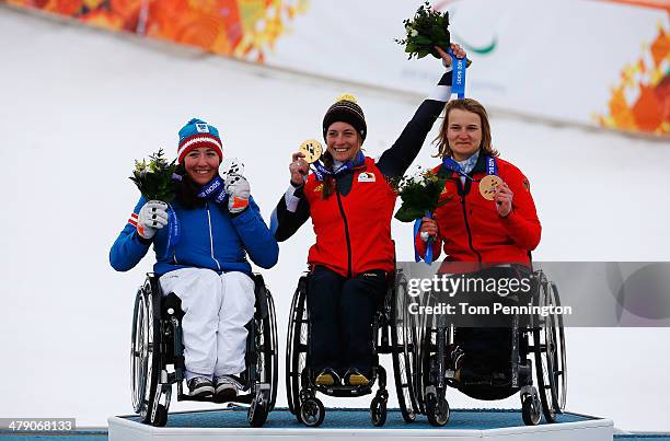 Gold medalist Anna Schaffelhuber of Germany, silver medalist Claudia Loesch of Austria and bronze medalist Anna-Lena Forster of Germany celebrate...