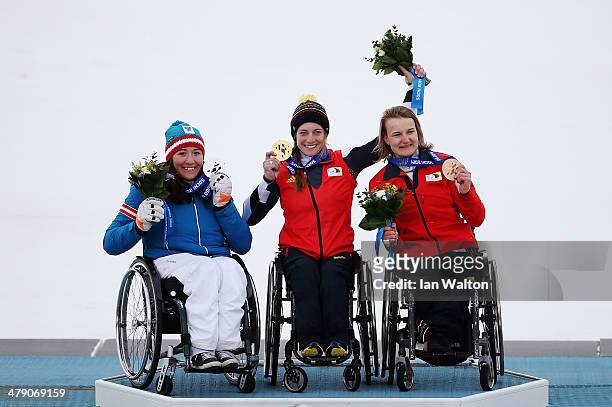Gold medalist Anna Schaffelhuber of Germany, silver medalist Claudia Loesch of Austria and bronze medalist Anna-Lena Forster of Germany celebrate...