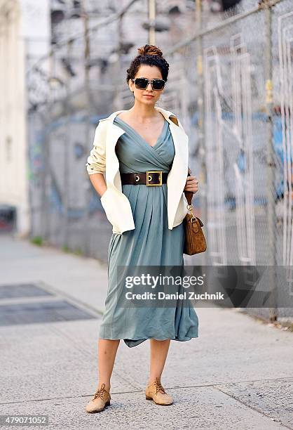 Actress Kangana Ranaut is seen around Soho wearing a Gucci dress, Burberry jacket, Prada sunglasses and a Gucci belt and bag in New York City.