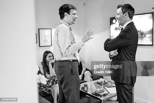 Episode 217 -- Pictured: David Remnick, New Yorker editor talks with host Seth Meyers backstage on June 9, 2015 --